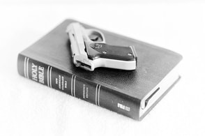 Handgun and Bible
